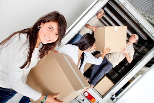 Customer moving items safely in a self storage unit